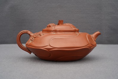 A Chinese Yixing stoneware flower-shaped teapot, Kangxi