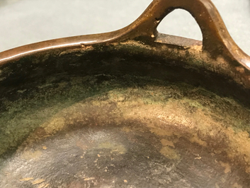 A Chinese bronze tripod censer, Xuande mark, 19th C.