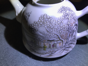 A Chinese polychrome 'winter landscape' teapot and a covered mug, 20th C.