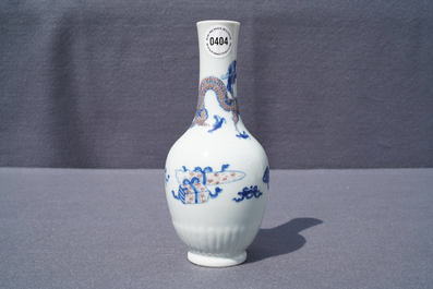 A Chinese blue, white and underglaze red 'dragon' vase, Kangxi
