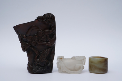 A Chinese jade archer's ring, a horn libation cup and a Beijing glass brush washer, 18th C. and later