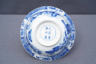 A Chinese blue and white klapmuts bowl with figural design, Kangxi mark and of the period