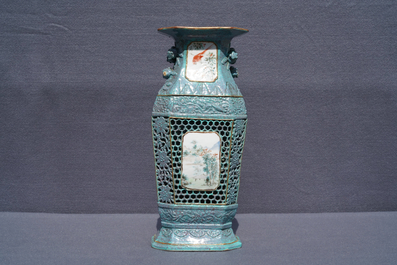 A Chinese reticulated robin's egg-ground qianjiang cai vase, 19th C.