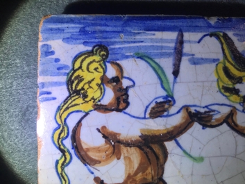 A polychrome Dutch Delft 'Triton and mermaid' tile, Rotterdam, 1st quarter 17th C.