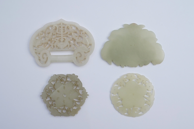 Seven Chinese white and celadon jade buttons, 18/20th C.