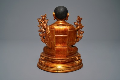 A large Chinese carved lacquered giltwood figure of Tsongkhapa, 18th C.