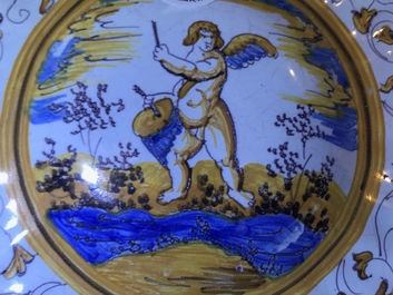 A lobed Dutch maiolica dish on foot with a putto surrounded by grotesques, Willem Jansz Verstraeten, Haarlem, ca. 1650