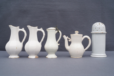 Four white Dutch Delft jugs, a pair of lobed plates and a large shaker, 17/18th C.