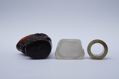 A Chinese jade archer's ring, a horn libation cup and a Beijing glass brush washer, 18th C. and later