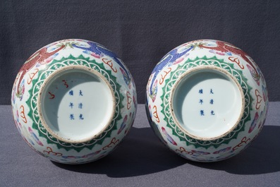 A pair of Chinese famille rose 'dragon' vases, Guangxu mark and of the period