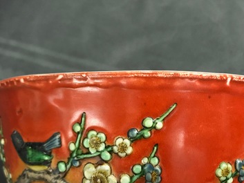 A Chinese coral-red relief-decorated bowl, 19th C.