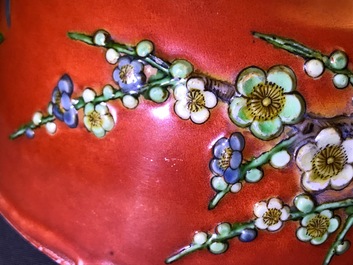 A Chinese coral-red relief-decorated bowl, 19th C.