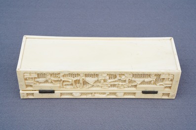 A Chinese carved ivory casket, a cardholder and a notebook, Canton, 19th C.