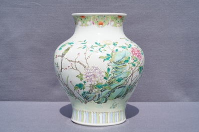 A Chinese famille rose vase with a bird on a flowering branch, 19th C.