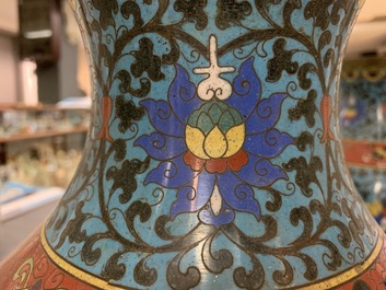 A pair of Chinese cloisonn&eacute; 'lotus scroll' hu vases, 18th C.