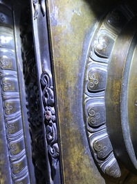 A large parcel-gilt inlaid bronze stupa, Tibet, 18th C.