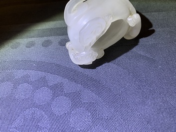 A Chinese jade archer's ring, a horn libation cup and a Beijing glass brush washer, 18th C. and later