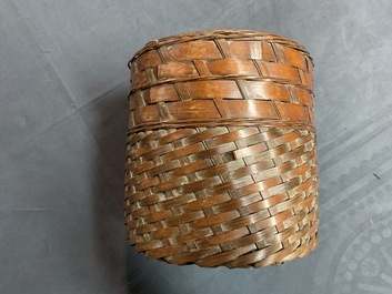 Eleven Japanese bamboo ikebana baskets including three signed examples, Meiji/Showa, 19/20th C.