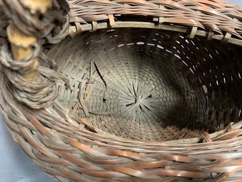 Eleven Japanese bamboo ikebana baskets including three signed examples, Meiji/Showa, 19/20th C.