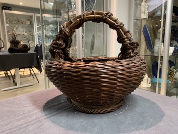 Eleven Japanese bamboo ikebana baskets including three signed examples, Meiji/Showa, 19/20th C.