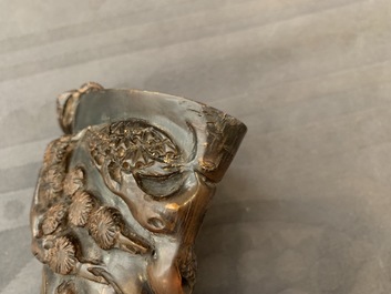 A Chinese jade archer's ring, a horn libation cup and a Beijing glass brush washer, 18th C. and later