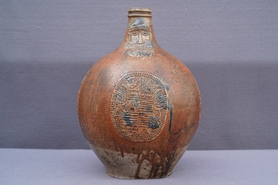 A large German stoneware Bellarmine jug with blue marriage seals, Frechen, 1st half 17th C.