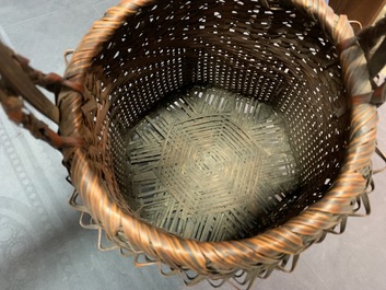 Eleven Japanese bamboo ikebana baskets including three signed examples, Meiji/Showa, 19/20th C.