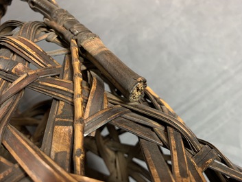 Eleven Japanese bamboo ikebana baskets including three signed examples, Meiji/Showa, 19/20th C.