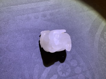 A Chinese jade archer's ring, a horn libation cup and a Beijing glass brush washer, 18th C. and later