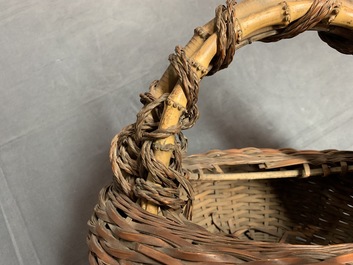 Eleven Japanese bamboo ikebana baskets including three signed examples, Meiji/Showa, 19/20th C.