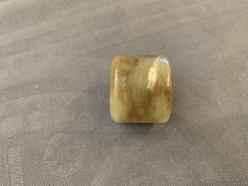 A Chinese jade archer's ring, a horn libation cup and a Beijing glass brush washer, 18th C. and later