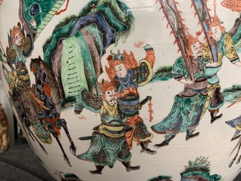 A large Chinese famille verte fish bowl with a narrative scene all-round, 19th C.