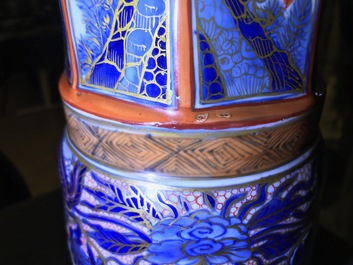 A Chinese blue and white vase with European clobbered decoration, Kangxi