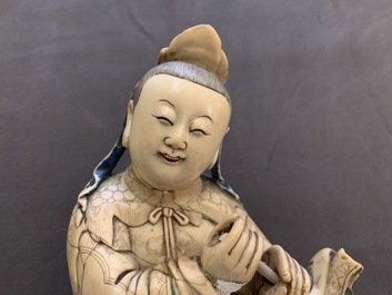 A Chinese soapstone figure of the immortal Han Xiangzi, Kangxi