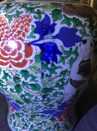 A Chinese wucai 'boys and peony scrolls' vase, 19th C.