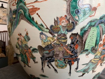 A large Chinese famille verte fish bowl with a narrative scene all-round, 19th C.