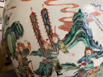 A large Chinese famille verte fish bowl with a narrative scene all-round, 19th C.