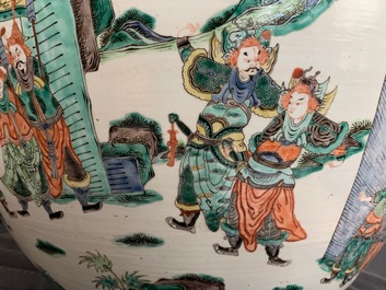 A large Chinese famille verte fish bowl with a narrative scene all-round, 19th C.