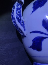 An unusual Japanese Arita blue and white jug with birds among foliage, Edo, 17th C.
