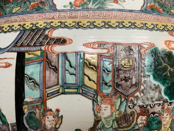 A large Chinese famille verte fish bowl with a narrative scene all-round, 19th C.