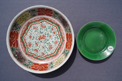 A Chinese famille verte dish and a monochrome green plate, Kangxi