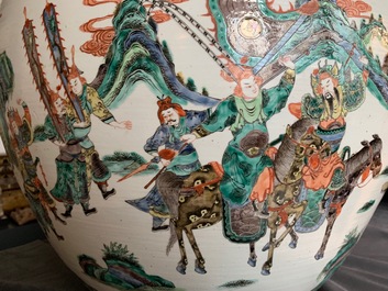 A large Chinese famille verte fish bowl with a narrative scene all-round, 19th C.