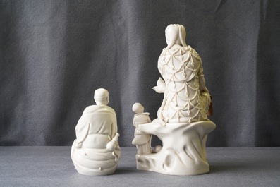 Two Chinese Dehua blanc de Chine models of a Luohan and Guanyin with servant, 19th C.