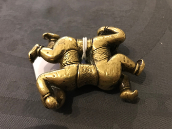 A Chinese gilt bronze Hoho brothers scroll weight, 18/19th C.