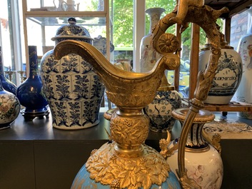 A pair of massive gilt bronze-mounted S&egrave;vres porcelain ewers and a jardini&egrave;re, France, 19th C.
