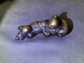 Four Chinese bronze scroll weights, 18/19th C.