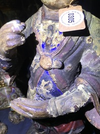 Een grote Chinese koud beschilderde bronzen figuur van een tempelwachter, Ming