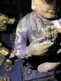Une grande figure d'un gardien en bronze et polychromie, Chine, Ming