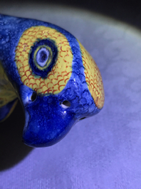 A pair of polychrome Dutch Delft models of parrots, 18th C.