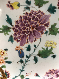 A Holitsch faience famille rose-style chinoiserie plate, Hungary, 18th C.